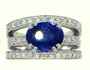 BAGUE TROIS RANGS SERTIS