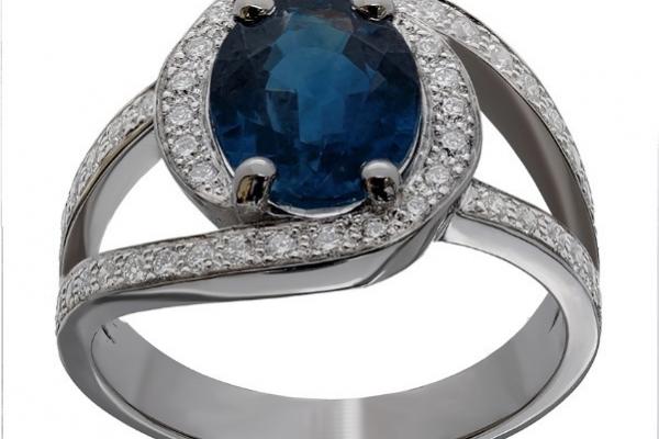 BAGUE SERTIE D'UNSAPHIR OVALE  PESANT 2,64 CARATS ET  DE 0,45 CARAT DEDIAMANTS