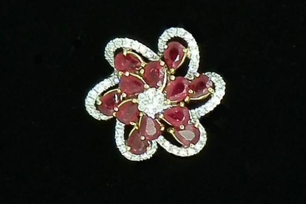 Bague marguerite rubis et diamants