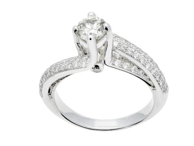 Bague solitaire diamants en or 18 carats sertie d'un diamant central de 0,40 carat 