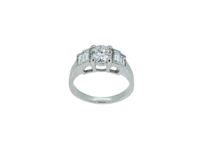 Bague de fiançailles en or blanc 18 carats sertie de 5 diamants
