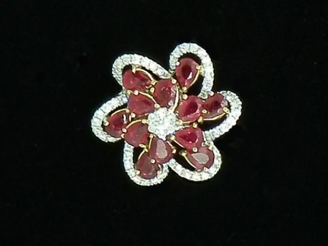 Bague marguerite rubis et diamants